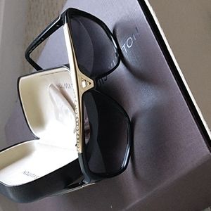 Louis Vuitton sunglasses with case .